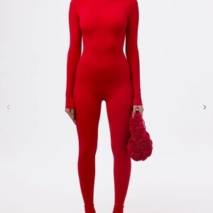 Bold Red Jumpsuit with Long Sleeves and High Neck